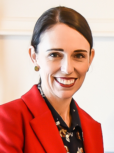 Jacinda Ardern, New Zealand Prime Minister, head and shoulders in red jacket.