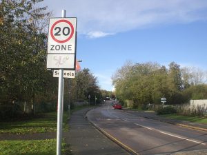 20mph zone sign in suburban road